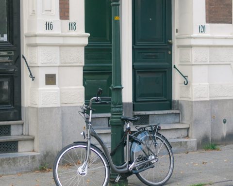 a bicycle on the sidewalk