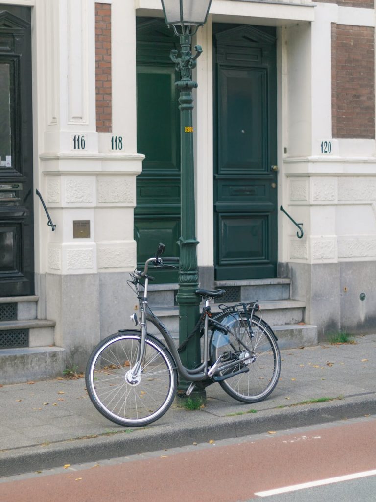 a bicycle on the sidewalk